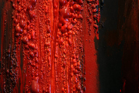 Image of blood and guts splattered against a black surface.  Background image for horror / , etc.