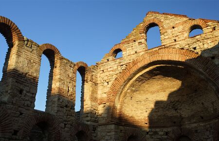 The ruins of an ancient basilica in Nessebar, Bulgaria - late in the day as the sun started to set.の写真素材