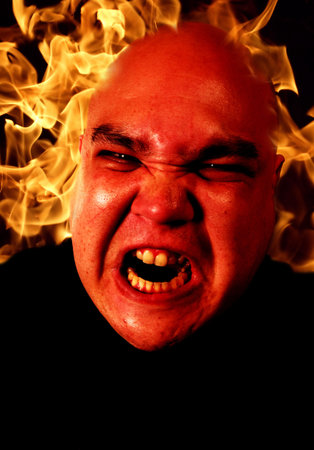 Image of fire and a demonic man.  Two files merged together and enhanced. Flame image is from my...