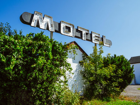 Photo of an old sign from an abandoned motel.の写真素材
