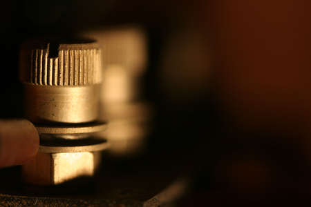 A picture of an old screw inside an 1930 era grammaphoneの写真素材