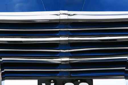 photograph of the grill on an old classic car in mint condition, shining chrome and highly polished finish , absolutely beautifulの写真素材