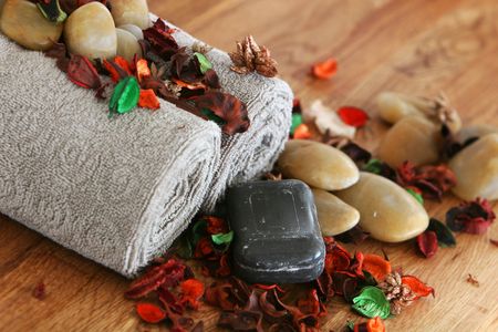 A still live of spa items, set up on solid oak, very soothing eartly colors,の写真素材