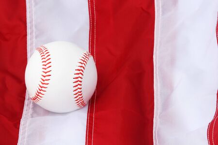 baseball lying on the us flag, great backgroundの写真素材