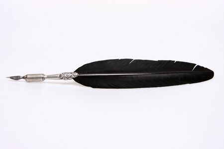 Old fashioned venetian feather quill with intricate silver の写真素材