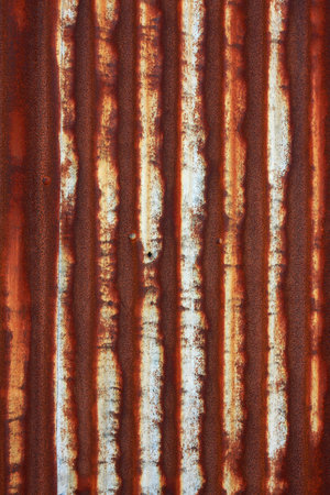 Full frame shot of a rusty piece of metal, high detail and texture, great for backgrounds in your designsの写真素材