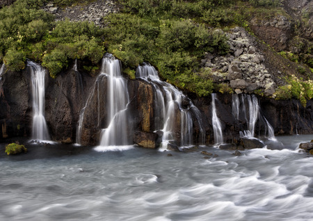 Hraunfossar in western Iceland in late summer. Long exposure to blur the fast moving water a bit.の写真素材
