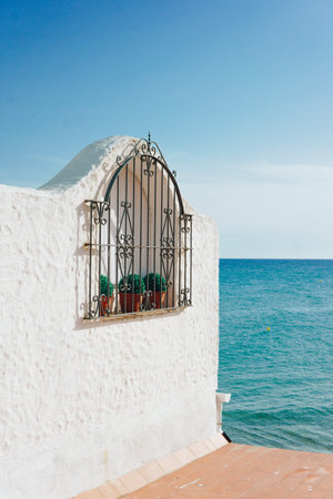 A large white building with sea view