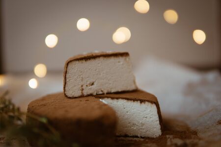 ricotta cheese in cocoa on top of a tableの写真素材