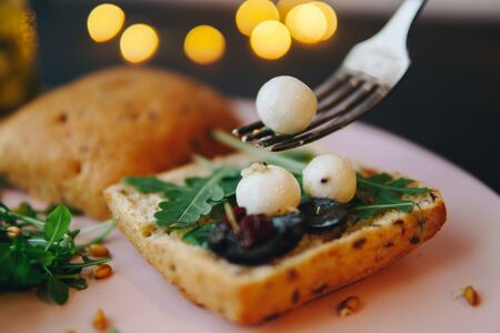 Chevre cheese on bread of food on a tableの写真素材