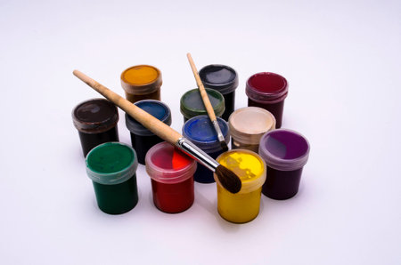 Gouache paint and brushの写真素材