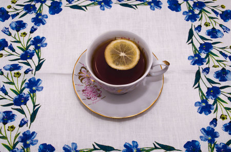 cup of tea on a linen napkinの写真素材