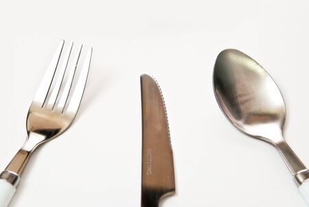 knife fork spoon in the table. Grey backgroundの写真素材