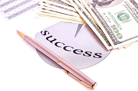 Business chart, money, calctulator and pen isolated on whiteの写真素材