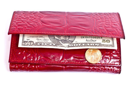 Fifty one dollar in red wallet, white background
