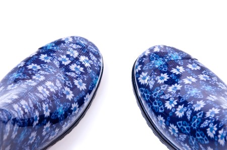 Blue rubber shoe isolated on white backgroundの写真素材