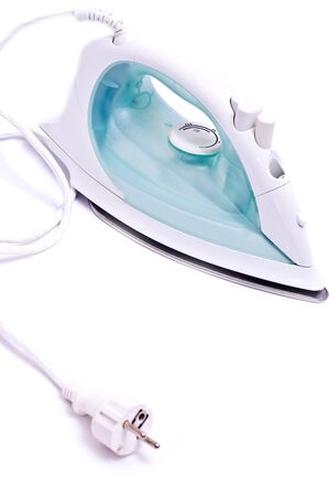 Electric white house iron isolated on whiteの写真素材