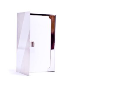 Business card in steel card holder isolated on whiteの写真素材