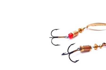 Two fishing hooks isolated on whiteの写真素材