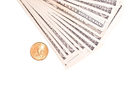 pile of dollars and one gold coin isolated on white