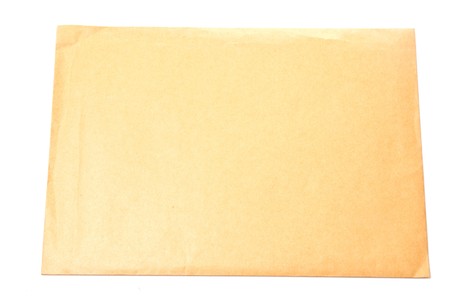Single yellow envelope isolated on white backgroundの写真素材