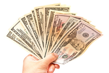 Money in man hand isolated on white