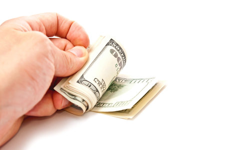 Man counting dollars. Isolated on white background