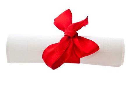 Diploma with a red ribbon isolated on a white backgroundの写真素材
