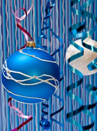 Christmas decoration from two  balls on blue backgroundの写真素材