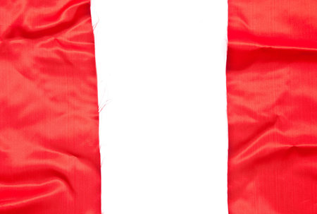 Shiny red textile background on white backgroundの写真素材