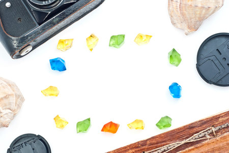 Vintage camera  and photo album with empty picture. Isolated on whiteの写真素材