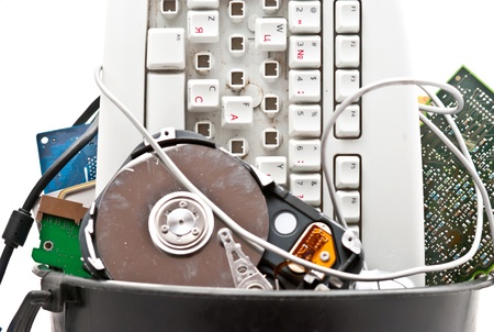 Broken hardware in basket isolated on white. Studio shot. の写真素材