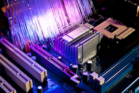Photo of computer motherboard with fiber optics background
