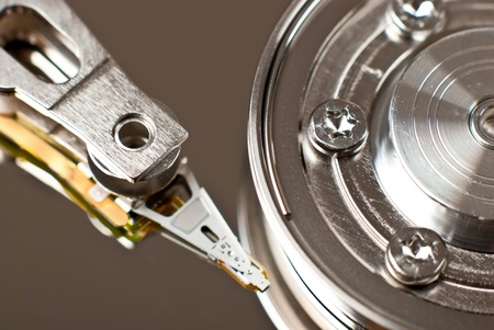 A close up macro of an opened harddriveの写真素材