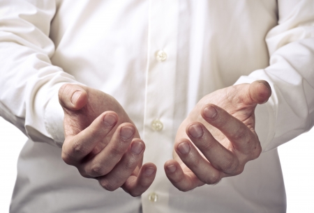 Businessman hands as if holding something. Focus on finger-tipsの写真素材