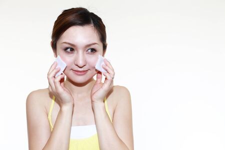 The woman who is doing skin care の写真素材