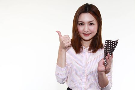 The female office worker who poses happilyの写真素材