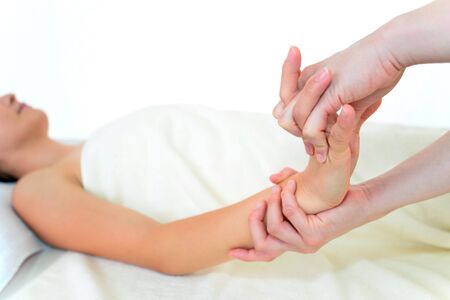 The woman who relaxes by massageの写真素材