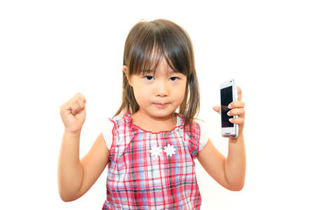 Portrait of little Asian girlの写真素材