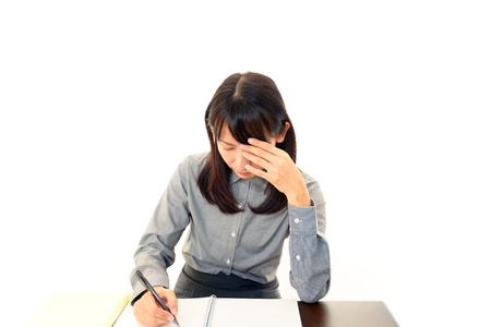 Expression of melancholy womanの写真素材