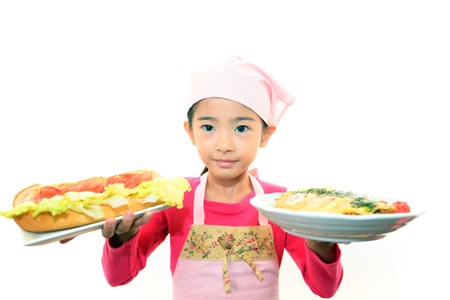 The girl who helps with a mealの写真素材