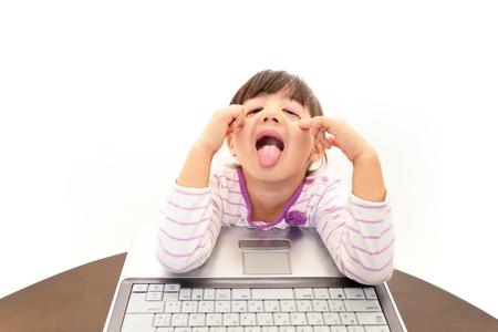  little girl using a laptopの写真素材