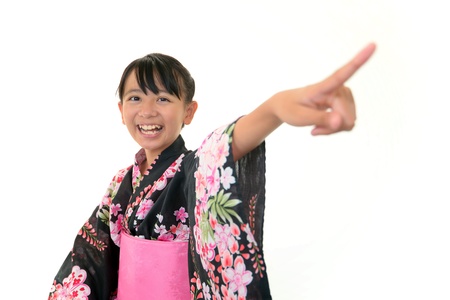 Smiling girl wearing a kimonoの写真素材