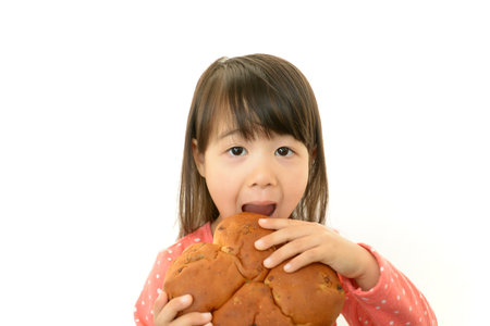 Girl having bread