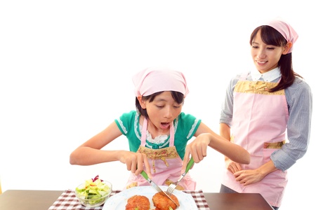Parent and child who enjoy a mealの写真素材