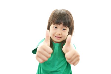 Happy little asian girl smileの写真素材