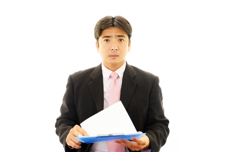 Businessman of an earnest expressionの写真素材