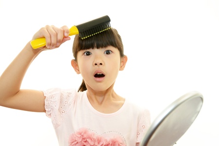 The girl who does hair careの写真素材