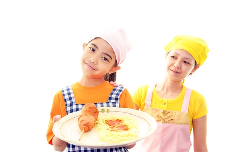 The girl who enjoys cookingの写真素材