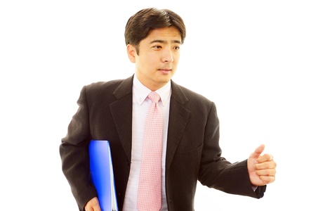 A businessman who has a  documents の写真素材